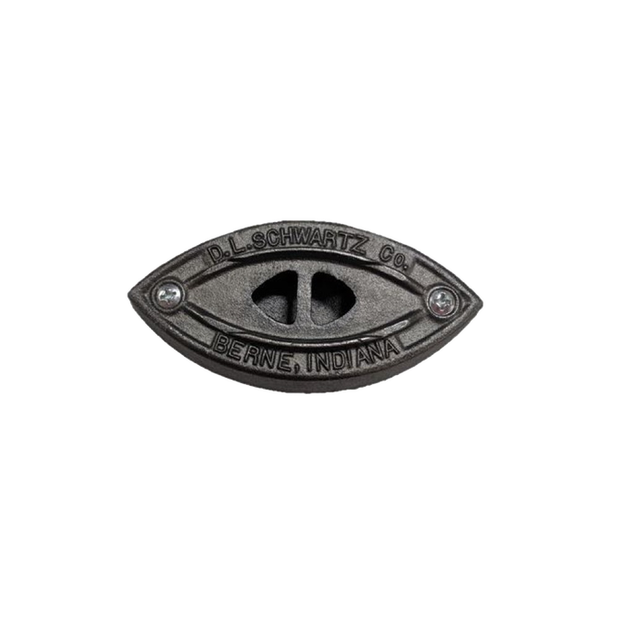 Handcrafted cast iron iron soleplate with ventilation holes, featuring "D.L. Schwartz Co., Berne, Indiana" engraving, made in USA, ideal for Home & Decor and Laundry Supplies collections.
