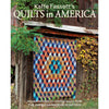 Colorful geometric quilt with intricate patchwork hanging on a rustic wooden barn wall surrounded by green foliage, featured in a handcrafted quilting book from Toys, Books & Games and Home and Garden How-To Books collections.