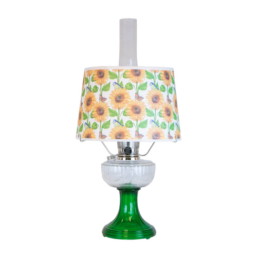 Handcrafted oil lamp featuring an Ohio-made emerald glass base with a Dennis Lipp shatterproof sunflower-patterned shade, ideal for Farm, Garden & Tool, Lamps & Lighting, and Emergency Supplies collections.