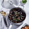 Handcrafted fully clad stainless steel 4-quart saute pan filled with cooked mussels and garnished with fresh herbs, featured in Kitchen & Food, Cookware, and Best Sellers collections.