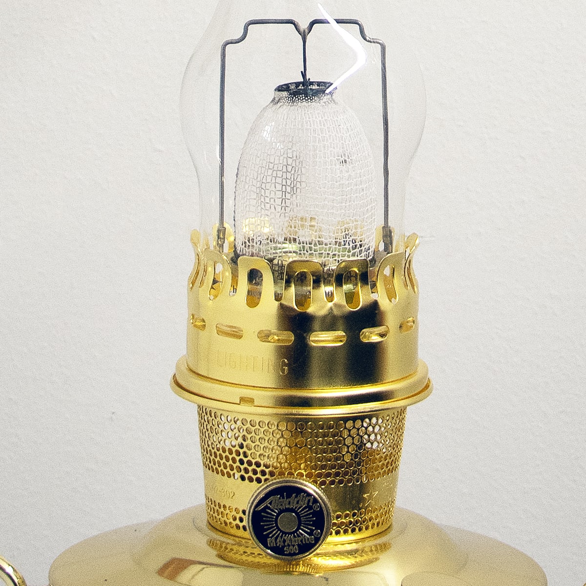Close-up of gleaming solid brass burner and glass chimney on a handcrafted deluxe hanging oil lamp, featured in Farm, Garden & Tool, Lamps & Lighting, Emergency Supplies, and Hanging Lamps collections.