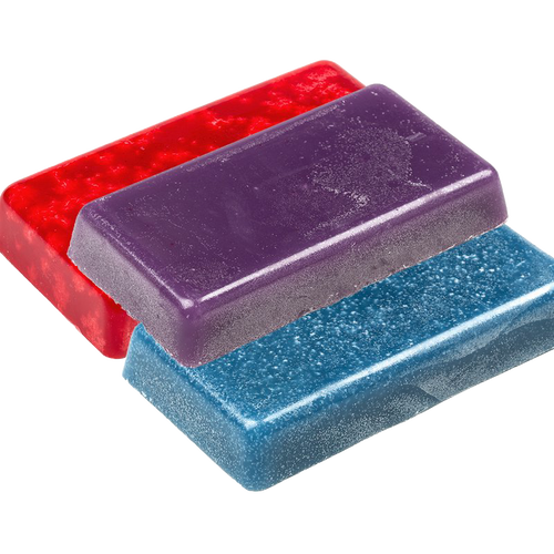 Three smooth blocks of scented candle wax in red, purple, and blue stacked together, a handcrafted product from Best Sellers and Candlemaking Supplies collections.