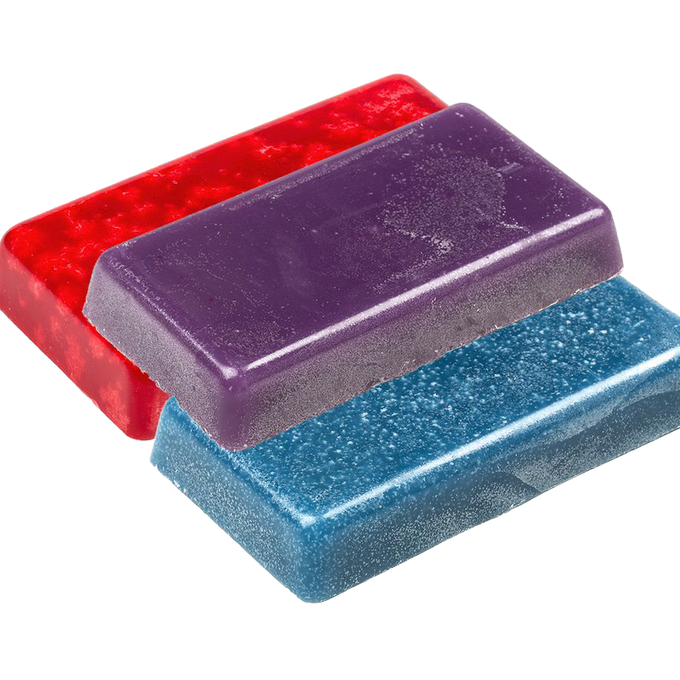 Three smooth blocks of scented candle wax in red, purple, and blue stacked together, a handcrafted product from Best Sellers and Candlemaking Supplies collections.
