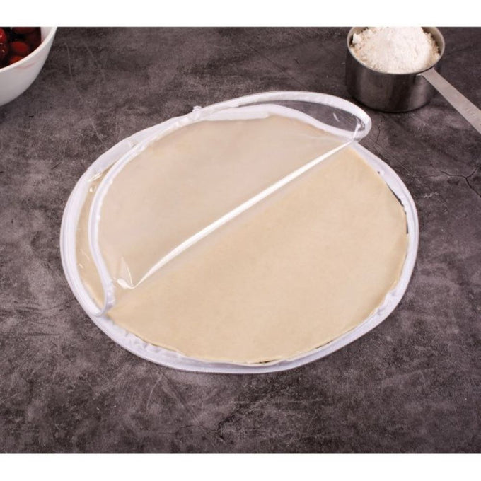 Clear zippered plastic dough bag being used to roll out an evenly sized circular crust, ideal for Kitchen & Food, Cookware, Baking Supplies, Best Sellers, and Promo Eligible collections.