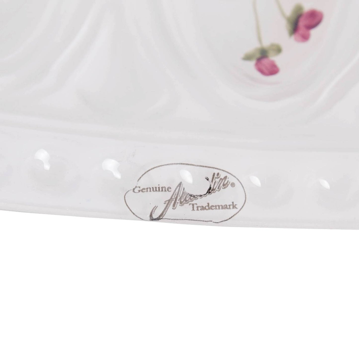 Close-up of the handcrafted Aladdin glass oil lamp shade edge featuring a subtle floral detail and embossed genuine trademark label, ideal for Lamps & Lighting and Lamp Shades collections.