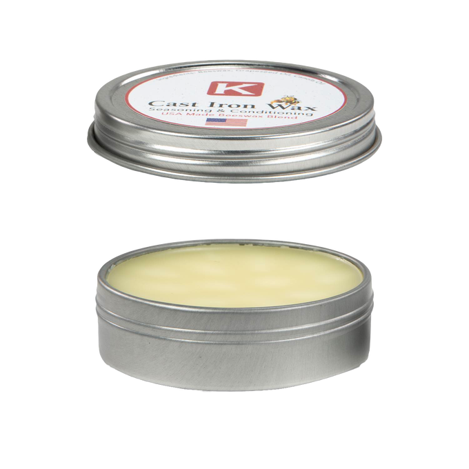 Open round metal tin containing natural beeswax blend for seasoning and conditioning cast iron and kitchen cookware, made in USA, ideal for Kitchen & Food and Cookware collections.