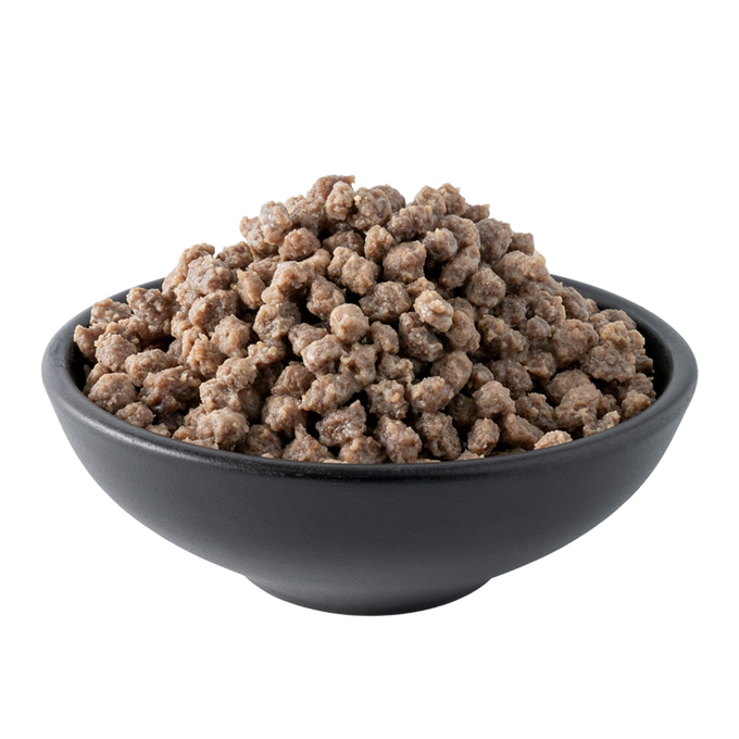 Black ceramic bowl filled with granular freeze-dried meat pieces, suitable for emergency supplies, farm and garden use, and USA made survival food collections.