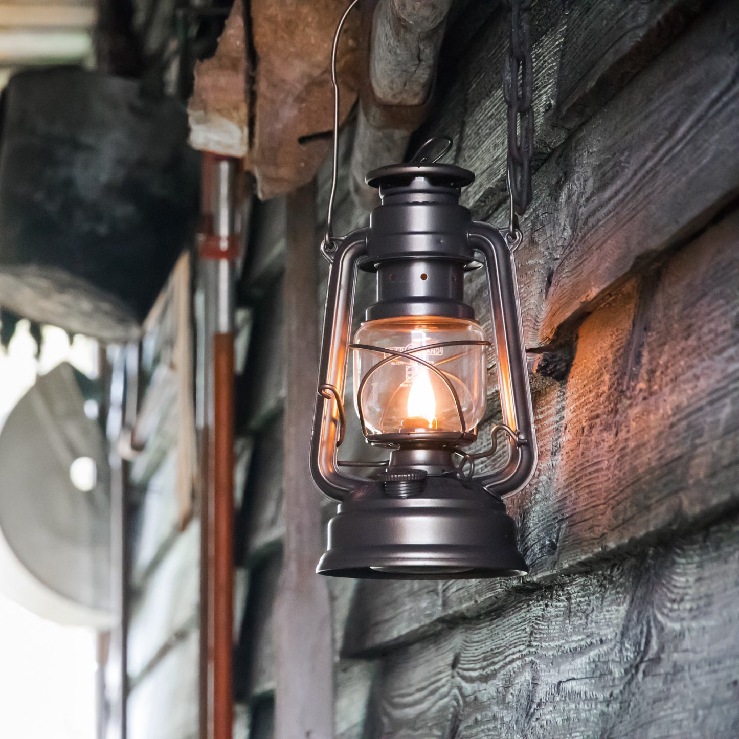 Handcrafted galvanized oil lantern with thermal heat-resistant SUPRAX globe, emitting warm light for camping, emergency supplies, and outdoor use in lamps & lighting and barn collections.