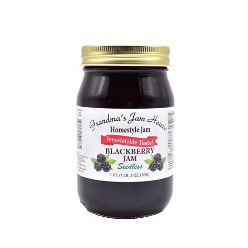 Handcrafted glass jar of seedless blackberry jam with gold lid and white label featuring blackberry illustrations, made in USA, ideal for Kitchen & Food, Pantry, Peanut Butter & Jellies, Best Sellers, and Promo Eligible collections.