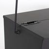 Close-up of a heavy-duty steel ash carrier bucket corner showing a sturdy hinge and handle attachment, ideal for safe ash cleanup in Stoves, USA Made, Hearth Accessories collections.