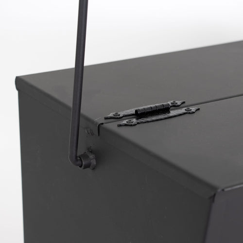 Close-up of a heavy-duty steel ash carrier bucket corner showing a sturdy hinge and handle attachment, ideal for safe ash cleanup in Stoves, USA Made, Hearth Accessories collections.
