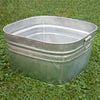 Square galvanized steel wash tub with handles, hot-dipped for durability, set on grass, suitable for indoor and outdoor use in Home & Decor and Laundry Supplies collections.