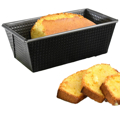 Non-stick heavy gauge steel loaf pan with corrugated sides holding a freshly baked golden bread, accompanied by three thick slices, ideal for Kitchen & Food, Baking Supplies, and Best Sellers collections.