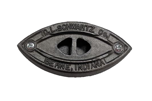 Close-up of a handcrafted cast iron nameplate with engraved text and vent holes, made in USA, featured in Home & Decor and Laundry Supplies collections.