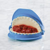 Blue dough press with scalloped edges holding filled cherry hand pie dough, designed for easy shaping and sealing in Kitchen & Food and Baking Helpers collections.