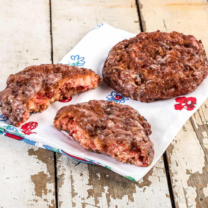 Freshly made fruit fritters with a sweet glaze, handmade and packed with fried fruit chunks, perfect for Kitchen & Food, Snacks and Sweets, Holiday Hosting, USA Made, Best Sellers, and Promo Eligible collections.