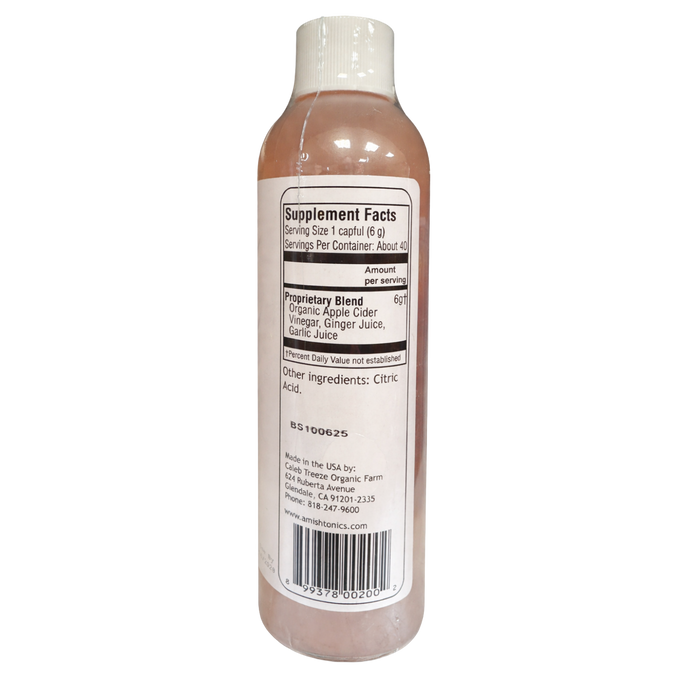 Clear bottle with white cap containing a natural tonic featuring organic apple cider vinegar, ginger juice, and garlic juice, highlighting handcrafted Amish muscle relief in Health & Wellness and USA Made collections.