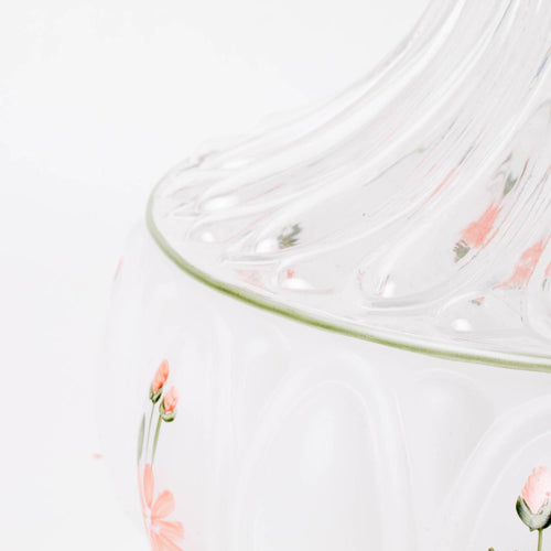Handcrafted glass lamp shade with delicate pink wildflower accents, designed to softly diffuse light from oil lamps, featured in Lamps & Lighting and Lamp Shades collections.