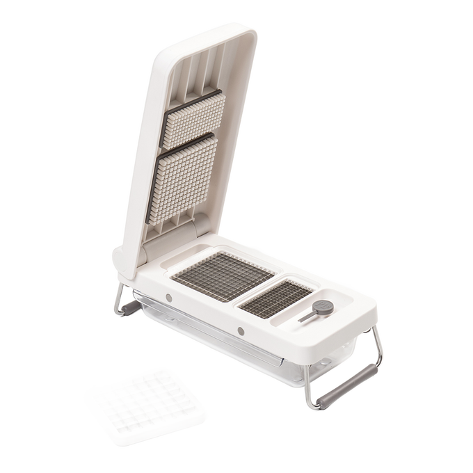 White hinged vegetable chopper with stainless steel grid blades and removable pusher, designed for efficient chopping and dicing, featured in Kitchen & Food and Food Prep collections.