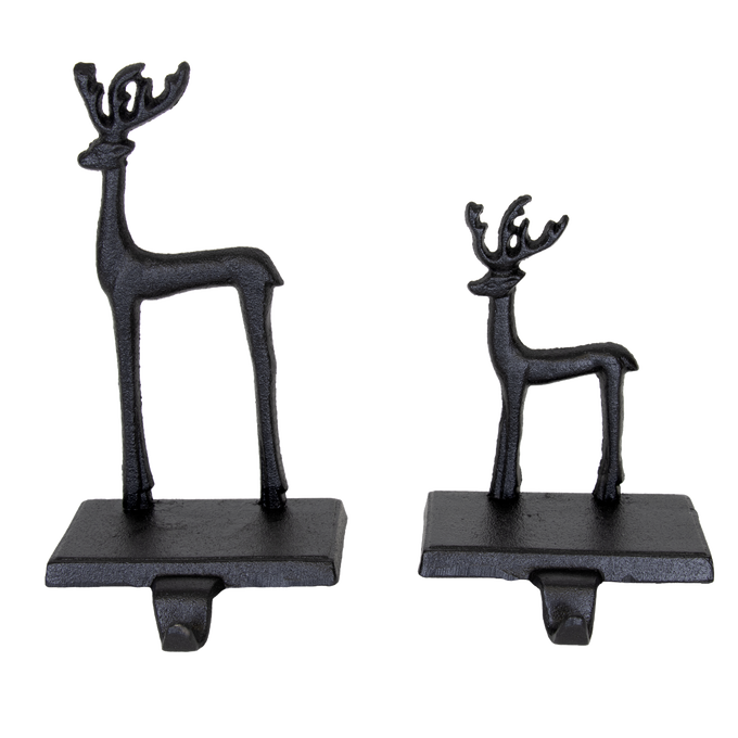 Set of two handcrafted black iron deer stocking holders in large and small sizes, designed for sturdy and charming holiday mantel display, perfect for Home & Decor and Holiday Decor collections.
