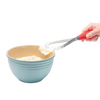 Hand holding a multi-functional red-handled whisk lifting whipped cream from a blue ceramic bowl, ideal for Kitchen & Food, Kitchen Gadgets, Cooking and Baking Helpers, Best Sellers, Promo Eligible collections.