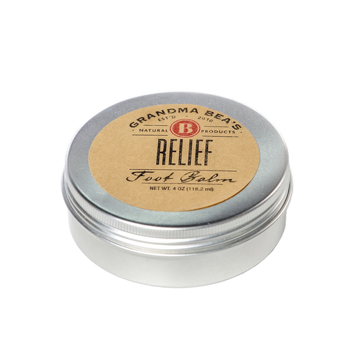 Handcrafted metal tin of soothing foot balm with a simple brown label, made in USA, featured in Health & Wellness, Balms, Creams and Lotions, and Best Sellers collections.