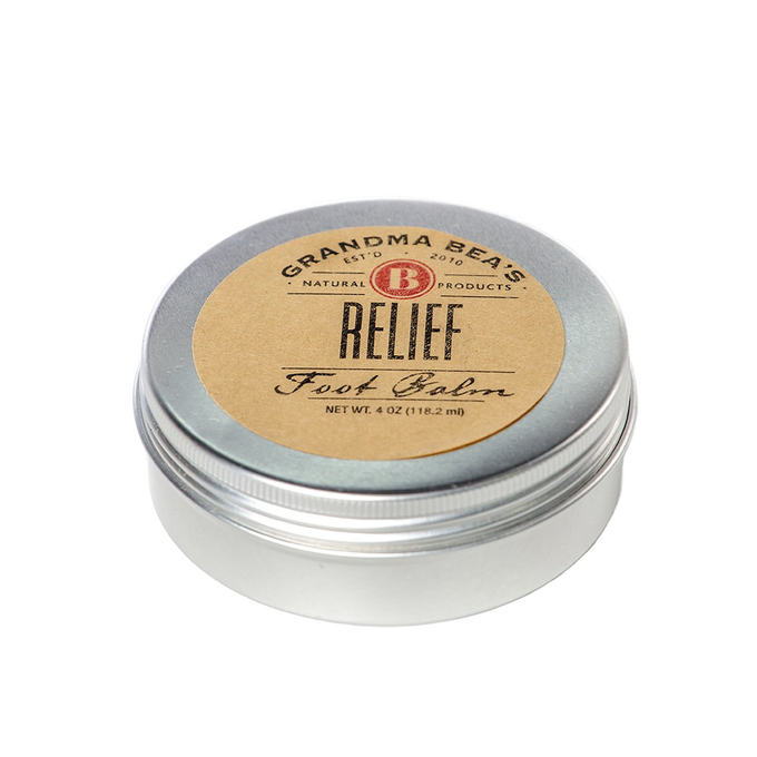 Handcrafted metal tin of soothing foot balm with a simple brown label, made in USA, featured in Health & Wellness, Balms, Creams and Lotions, and Best Sellers collections.