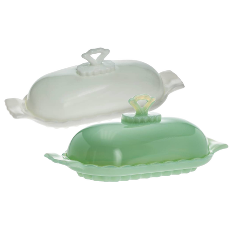 Two elegant glass stick butter dishes in soft green and milky white, featuring decorative handles and scalloped edges, ideal for Kitchen & Food, Dinnerware, Making Butter, USA Made, Best Sellers, Promo Eligible collections.