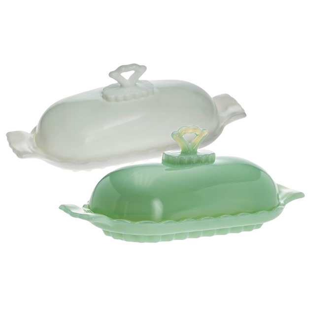 Two elegant glass stick butter dishes in soft green and milky white, featuring decorative handles and scalloped edges, ideal for Kitchen & Food, Dinnerware, Making Butter, USA Made, Best Sellers, Promo Eligible collections.