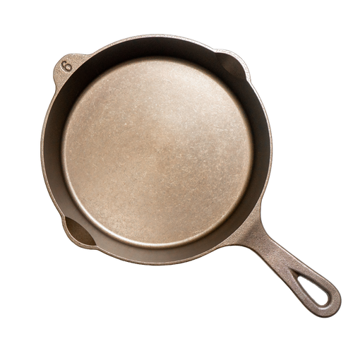 Top view of a handcrafted, lightweight cast iron skillet with smooth cooking surface and dual pour spouts, featuring the number 6 marking, ideal for Kitchen & Food, Camping, Cookware, Cast Iron, USA Made, and Best Sellers collections.