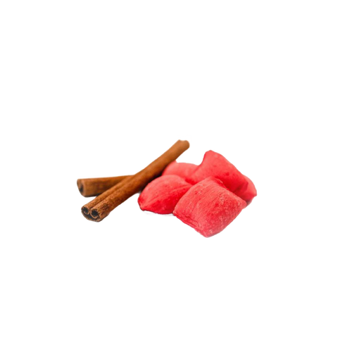 Two cinnamon sticks placed next to three soft, airy red sugar puffs, representing a light, handmade sweet treat from USA Made, Snacks and Sweets collection.