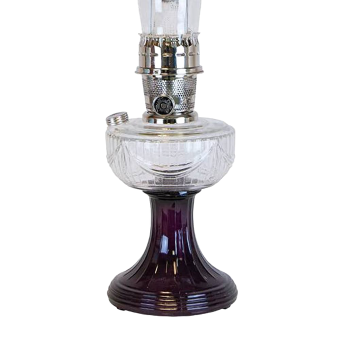 Vintage-style oil lamp with a clear glass font over an amethyst pedestal base, featuring a handcrafted design, ideal for Lamps & Lighting and Best Sellers collections.
