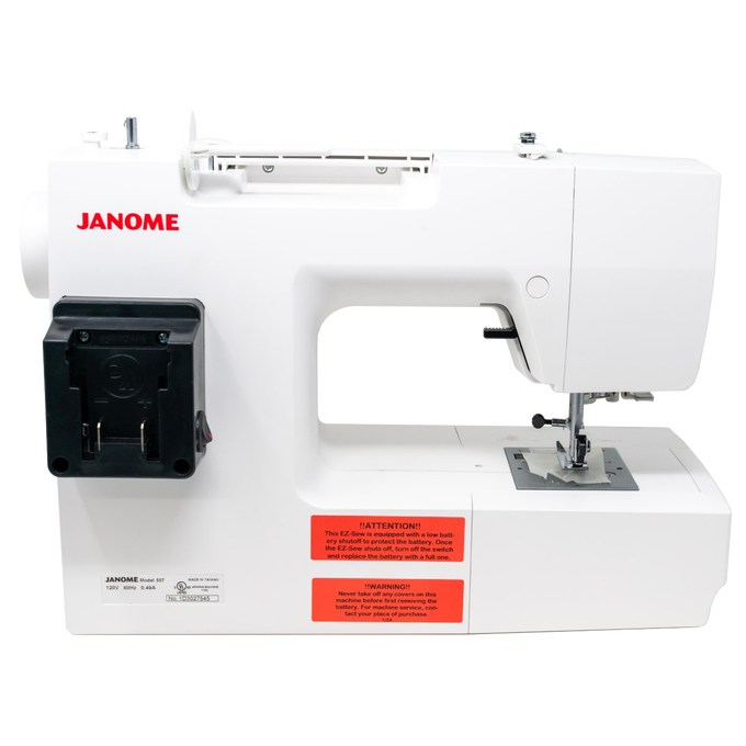 Compact white mechanical sewing machine designed to run on Milwaukee or DeWalt tool batteries, ideal for extended use in sewing and quilting, homesteading, and farm collections.