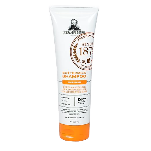 Tube of handcrafted buttermilk shampoo made in USA with nourishing honey and avocado oil, designed to revitalize dry, damaged, and color-treated hair, featured in Health & Wellness, Grooming and Personal Hygiene, USA Made, Best Sellers, and Promo Eligible collections.