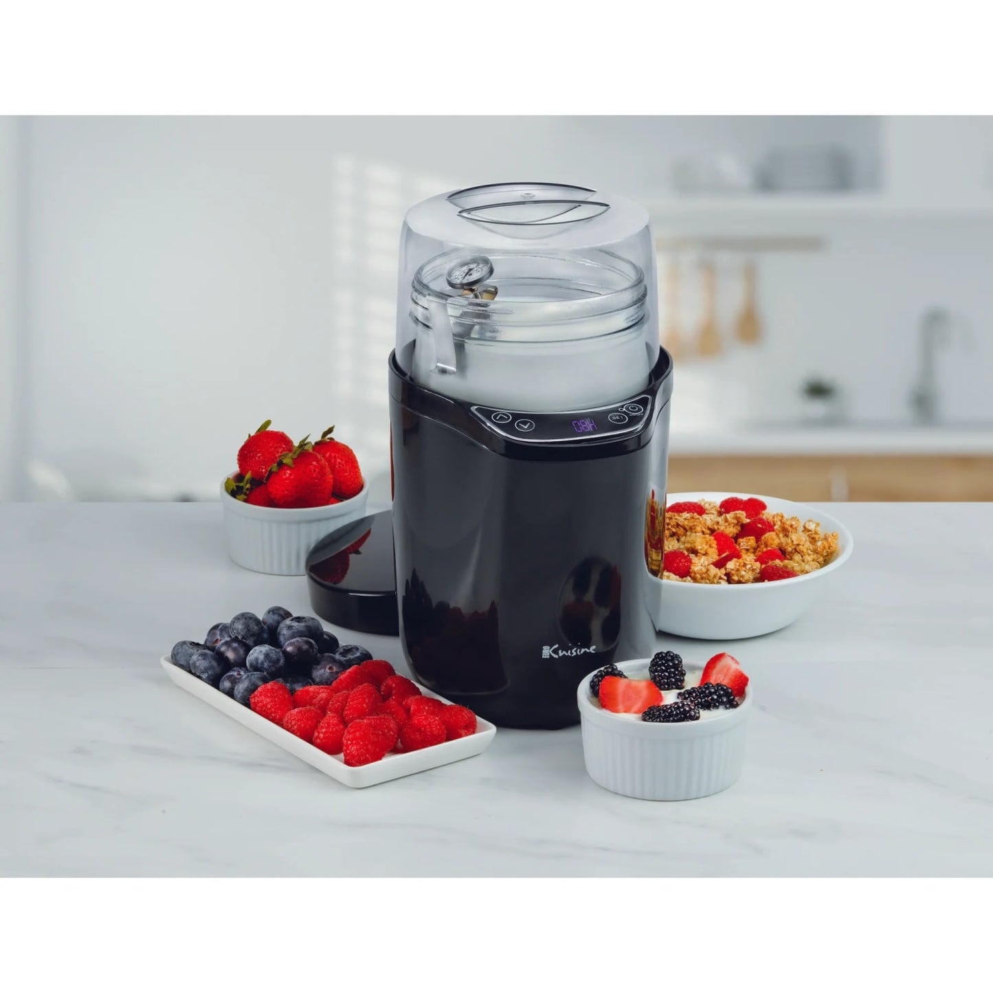 Compact electric yogurt and Greek yogurt maker with digital controls, shown with fresh berries and granola, featured in Kitchen & Food, Specialty Equipment, and DIY Cheese and Yogurt collections.