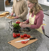 Lightweight, maintenance-free Epicurean board with utility hole, featuring sliced tomatoes and knife on countertop, ideal for Kitchen & Food, Food Prep, Knives, Sharpeners and Cutting Boards collections.