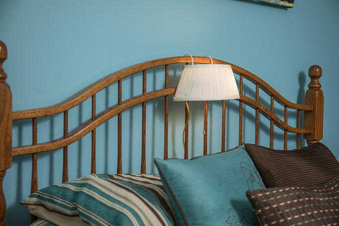 Handcrafted headboard lamp with pleated shade and pull chain switch, designed to slip over bed frame for convenient bedside lighting in Home & Decor and Lamps & Lighting collections.