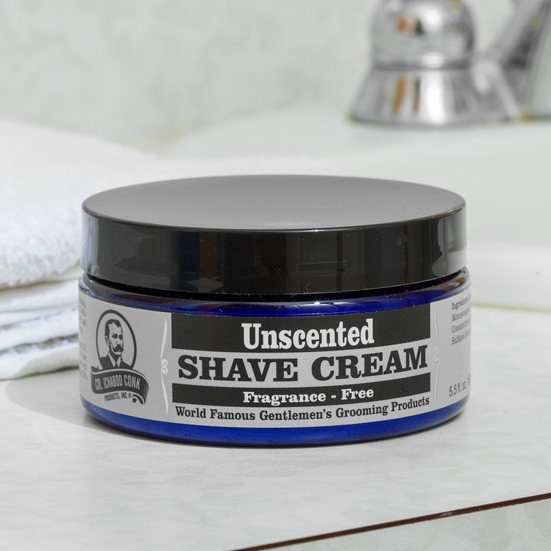 Jar of fragrance-free shave cream in a blue container with black lid, promoting clean grooming for gentlemen, featured in Health & Wellness and USA Made collections.
