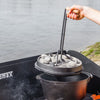 Steel tool with wooden handle designed for safely lifting hot Dutch oven lids during outdoor cooking, suitable for farm, garden & tool, camping, and best sellers collections.