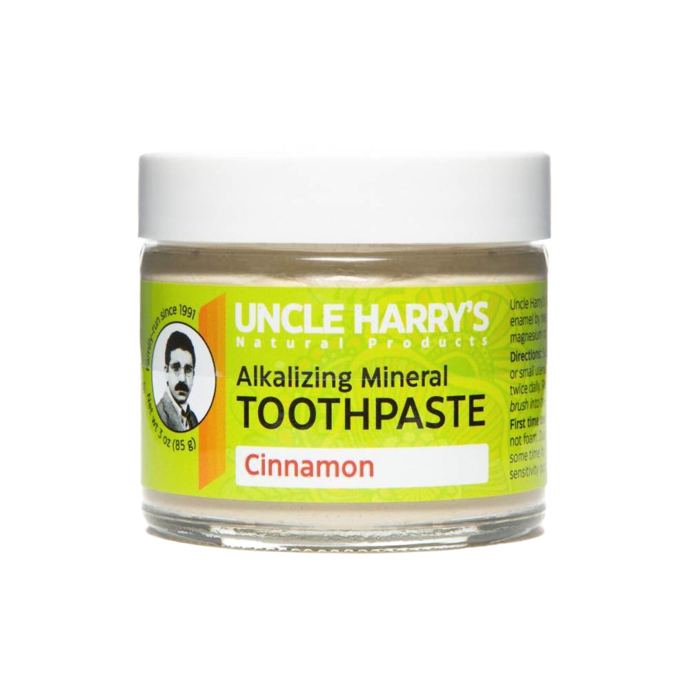 Handcrafted small glass jar of cinnamon-flavored alkalizing mineral toothpaste with white lid and bright yellow label, featured in Health & Wellness, Grooming and Personal Hygiene, USA Made, Best Sellers, and Promo Eligible collections.