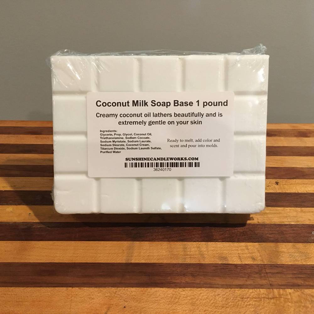 Handcrafted creamy soap base bar made with coconut milk and oil, designed for gentle skin care and easy melting, ideal for Health & Wellness and Soapmaking Supplies collections.