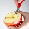 Hand using a handcrafted flexible paring knife with a red handle to core the center of a halved apple, ideal for fruit prep in Farm, Garden & Tool and Kitchen & Food collections.