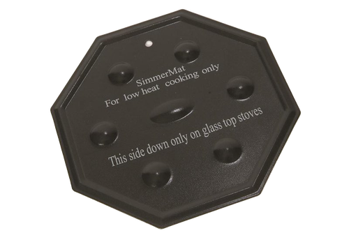 Octagonal black steel heat diffuser disc with raised bumps and engraved instructions for low heat use on glass top stoves, featured in Kitchen & Food and Cooking and Baking Helpers collections.