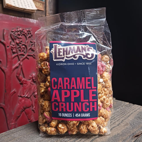 Clear bag of handcrafted caramel apple crunch popcorn with sweet and tangy apple flavor, made in USA, featured in Kitchen & Food, Snacks and Sweets, Popcorn, USA Made, and Best Sellers collections.