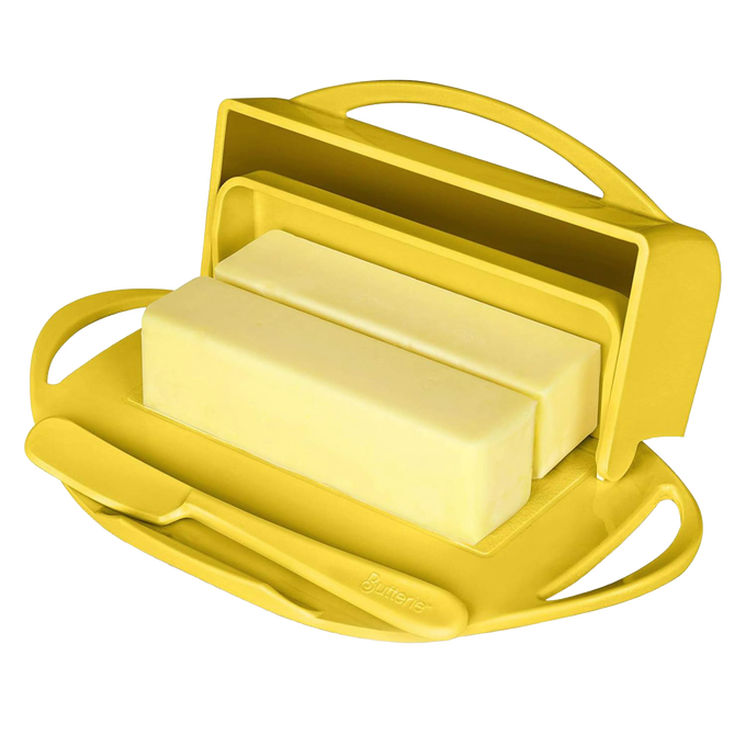 Yellow flip-top butter dish with a matching spreader resting in a designed cradle, offering mess-free butter storage and spreading, ideal for Kitchen & Food and Storage and Serving collections.