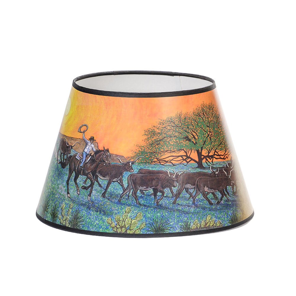 Parchment lamp shade featuring Southwestern artwork of a cowboy herding cattle at sunset, designed to soften lamp light, part of Lamps & Lighting and Best Sellers collections.