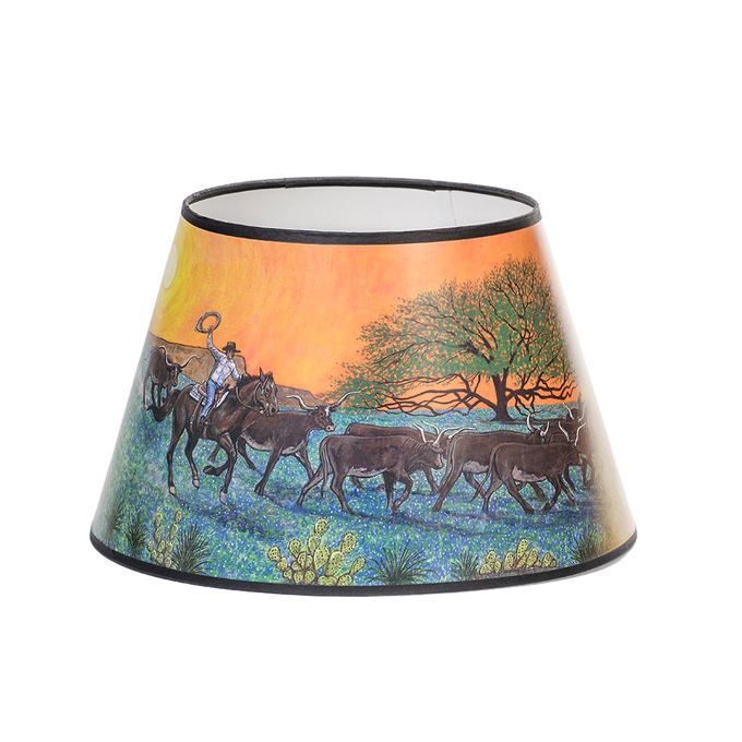 Parchment lamp shade featuring Southwestern artwork of a cowboy herding cattle at sunset, designed to soften lamp light, part of Lamps & Lighting and Best Sellers collections.