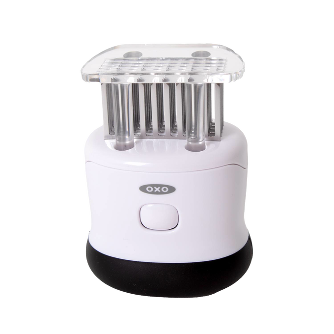 White and black OXO meat tenderizer with 58 stainless steel blades, safety lock, and non-slip grip, designed for Kitchen & Food, Specialty Equipment, and Butchering Supplies collections.
