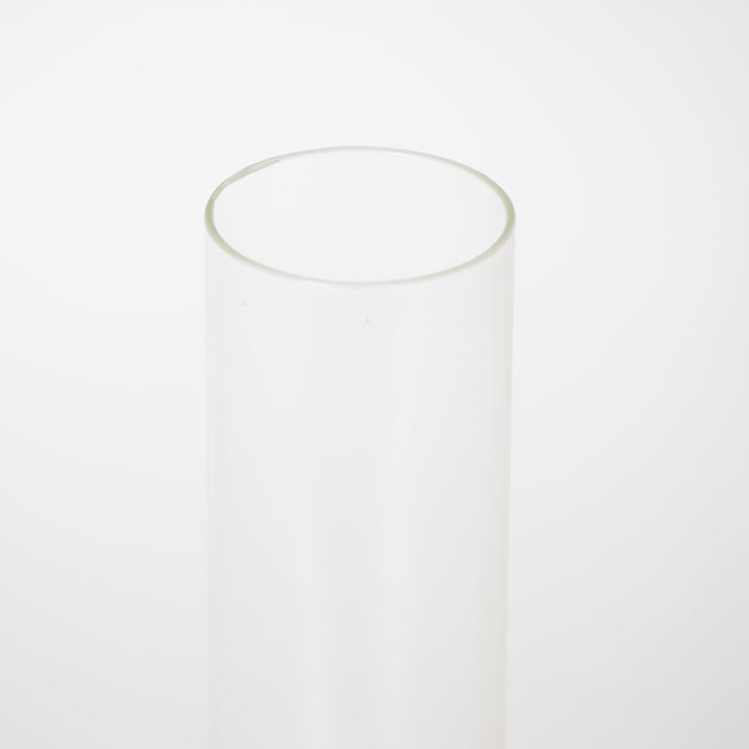 Clear glass oil lamp chimney with a 2-inch base, handcrafted for durability, suitable for lamps and featured in Lamps & Lighting, Parts and Accessories, and Chimneys and Globes collections.