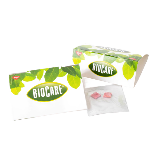 White rectangular cardboard box and folded trap with green leaf patterns and BioCare logo, accompanied by two small pink pheromone lure pads, featured in Home & Decor, Pest Control, Farm, Garden & Tool, Household Helpers, USA Made, Best Sellers, and Promo Eligible collections.